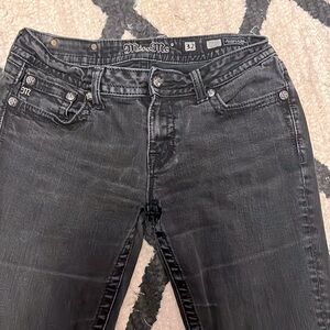 Black distressed in the bottom area